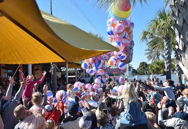 More than 1,500 beach balls dropped over the sandy beach overlooking the Choctawhatchee Bay at LuLu's at the Noon Year's Eve celebration.