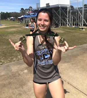 Destin's Avery Emmick earned two first place medals at the Seahawk Invitational. She placed first in the 100- and 200-meter events.