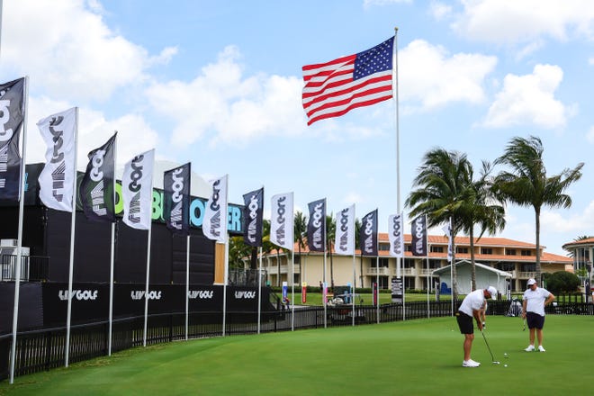 Apr 2, 2024; Doral, Florida, USA; Players work at the putting green during a LIV Golf Miami practice round at Trump National Doral. Mandatory Credit: Sam Navarro-USA TODAY Sports