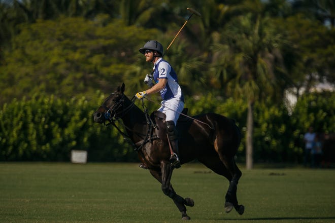 Duke of Sussex Prince Harry greets the crowd before a match at Grand Champions Polo in Wellington, Fla., on April 12, 2024.