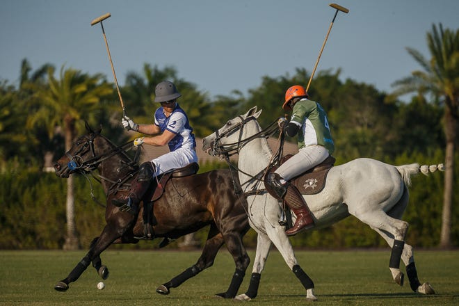 Duke of Sussex Prince Harry, left and Mohamed Julien Ndao compete in tonight's match at Grand Champions Polo in Wellington, Fla., on April 12, 2024.