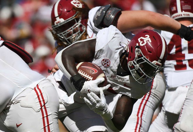 Apr 13, 2024; Tuscaloosa, AL, USA; Alabama running back Richard Young (25) runs the ball up the middle in the A-Day scrimmage at Bryant-Denny Stadium. Mandatory Credit: Gary Cosby Jr.-USA TODAY Sports