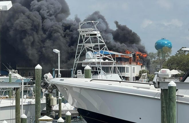 Tailfins on Destin harbor is on fire.