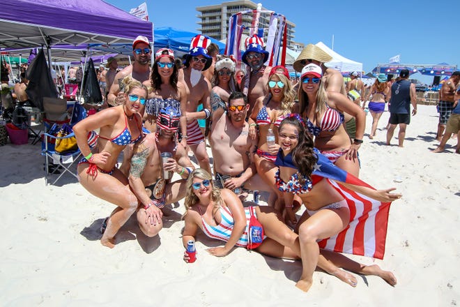 Thousands of people enjoy the second day of the annual Interstate Mullet Toss and Gulf Coast's Greatest Beach Party at the Flora-Bama Lounge, Package and Oyster Bar in Perdido Key on Saturday, April 27, 2019.