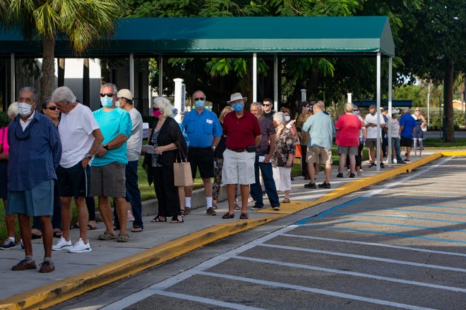 Community members stand in line to cast their votes in the 2020 Elections, Monday, Oct. 19, 2020, in the Collier County Government Center in East Naples.