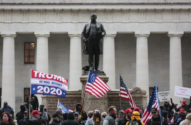 Supporters of President Donald J. Trump protest during a “Stop the Steal” rally on Wednesday, Jan. 6, 2021 at the Ohio Statehouse in Columbus, Ohio. Hundreds of supporters of President Donald Trump came to the Statehouse to protest the congressional certification of Democratic President-Elect Joseph R. Biden Jr., who defeated the incumbent Republican President Trump during the November 2020 elections and whose victory was certified by the Electoral College in December 2020.