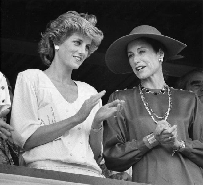 11/12/85 - Princess Diana, left and Jane Ylivisaker of the Palm Beach Polo and Country Club chat while Prince Charles competes in a polo match in this photo November 12, 1985 in Palm Beach.